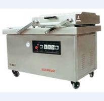 Double chamber vacuum packing machine